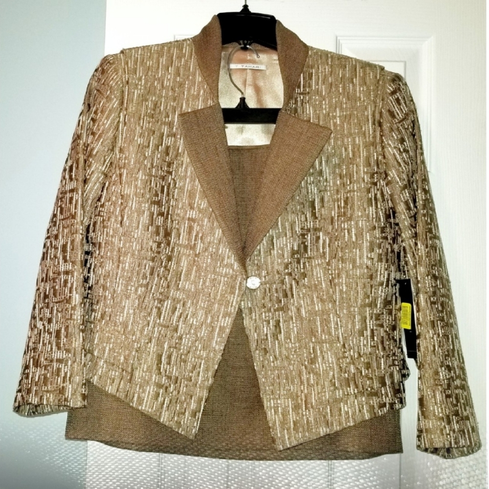 Classy tan skirt suit.